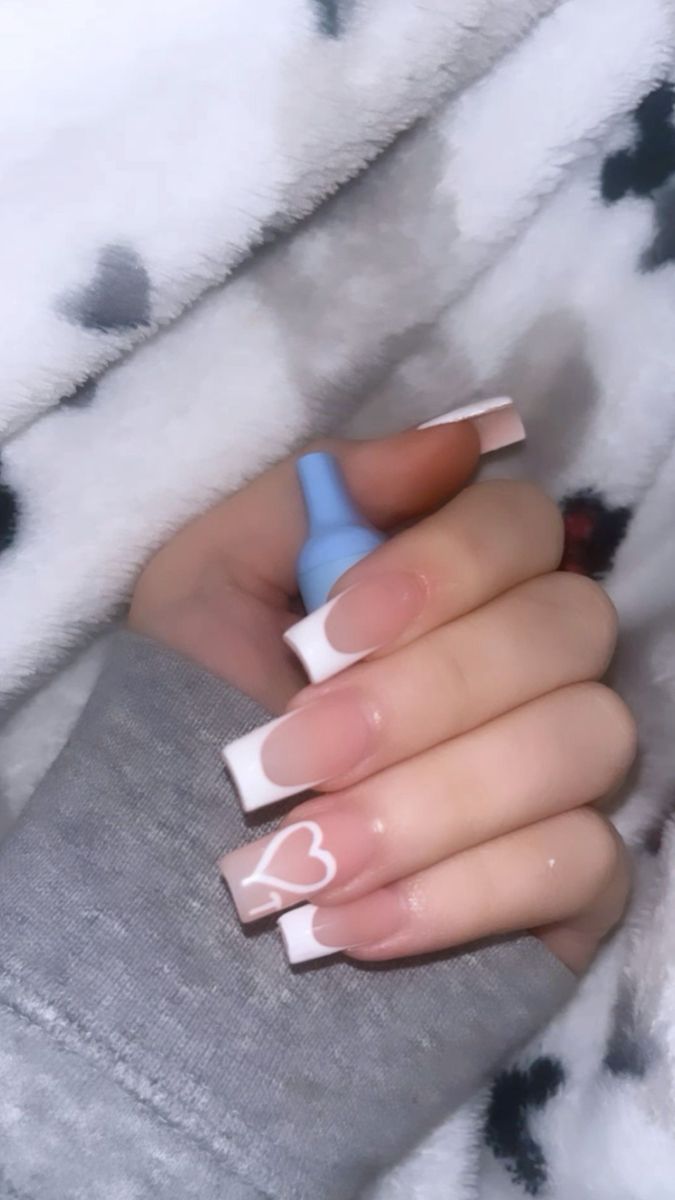 Chic French Manicure with Heart Design: A Playful Twist on Elegant Acrylic Nails