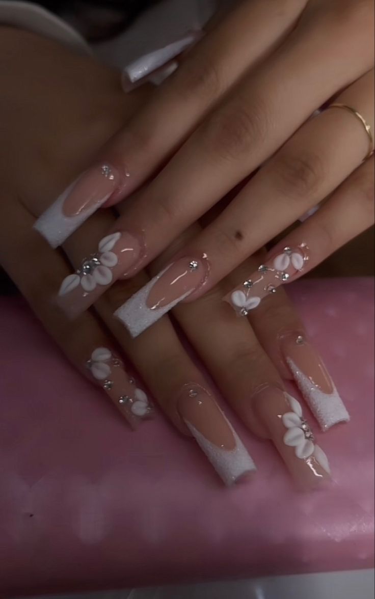 Whimsical Sophistication: Elegant Long Nails with Floral Design and Rhinestones