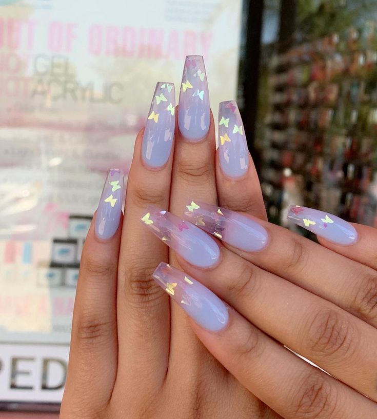 Chic Lavender Nails with Gold Butterfly Accents: A Perfect Blend of Whimsy and Sophistication.