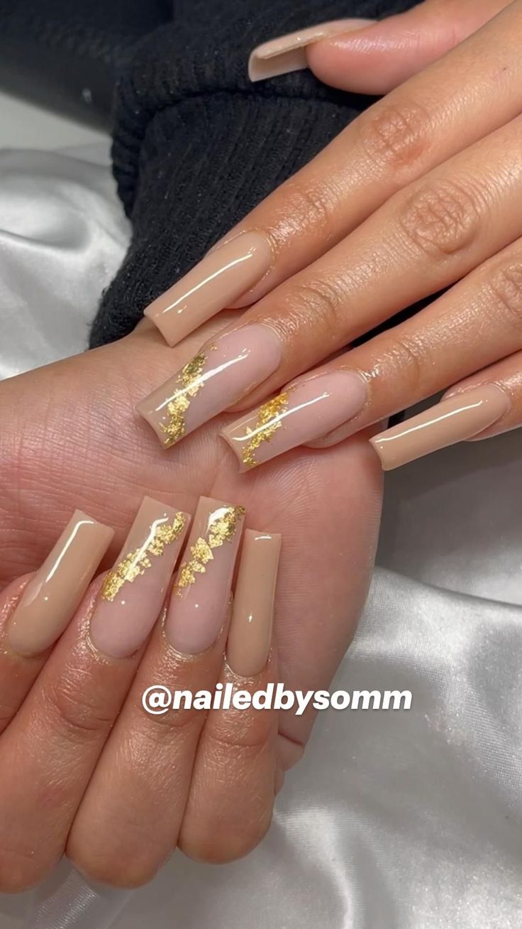 Sophisticated Chic: Elegant Nude Nails with Glamorous Gold Accents