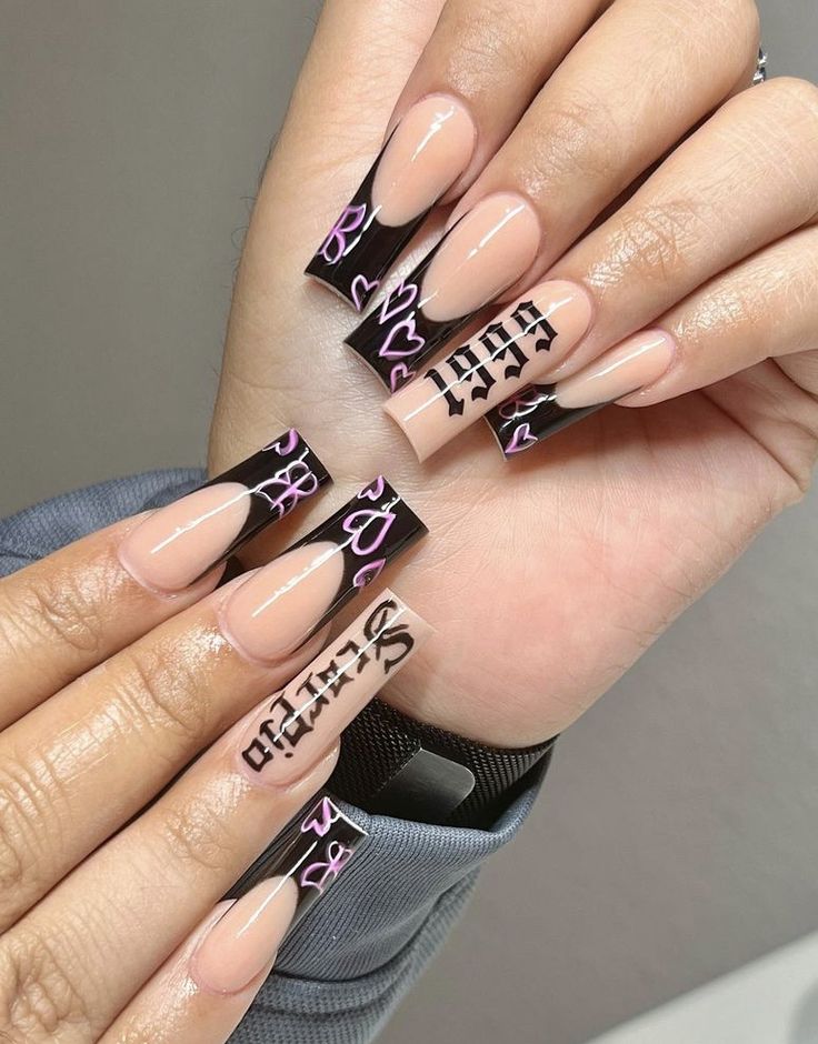 Chic Long Square Nail Design: Soft Nude Base with Bold Black Tips and Playful Purple Heart Accents.