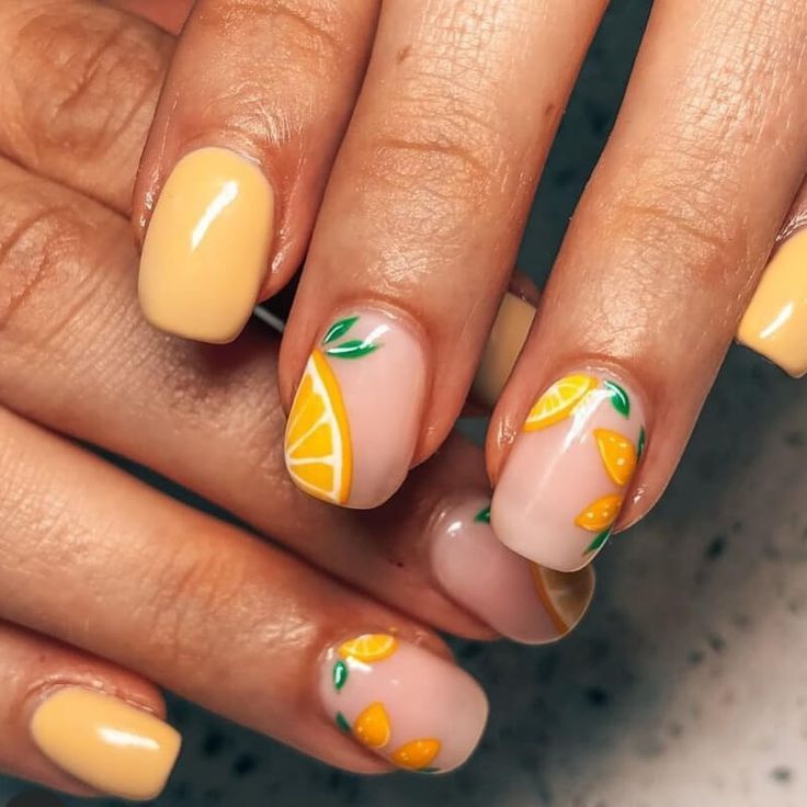 Bright Lemon Nail Art: Hand-Painted Citrus and Green Accents on Nude Base