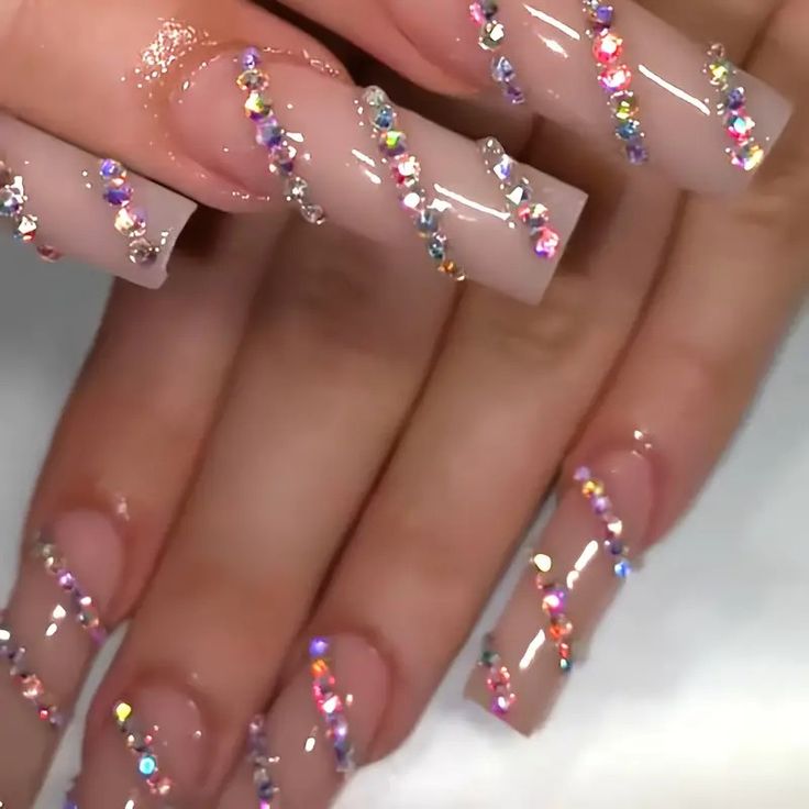 Chic Nude Nail Design with Shimmering Rhinestones for Elegant Glamour