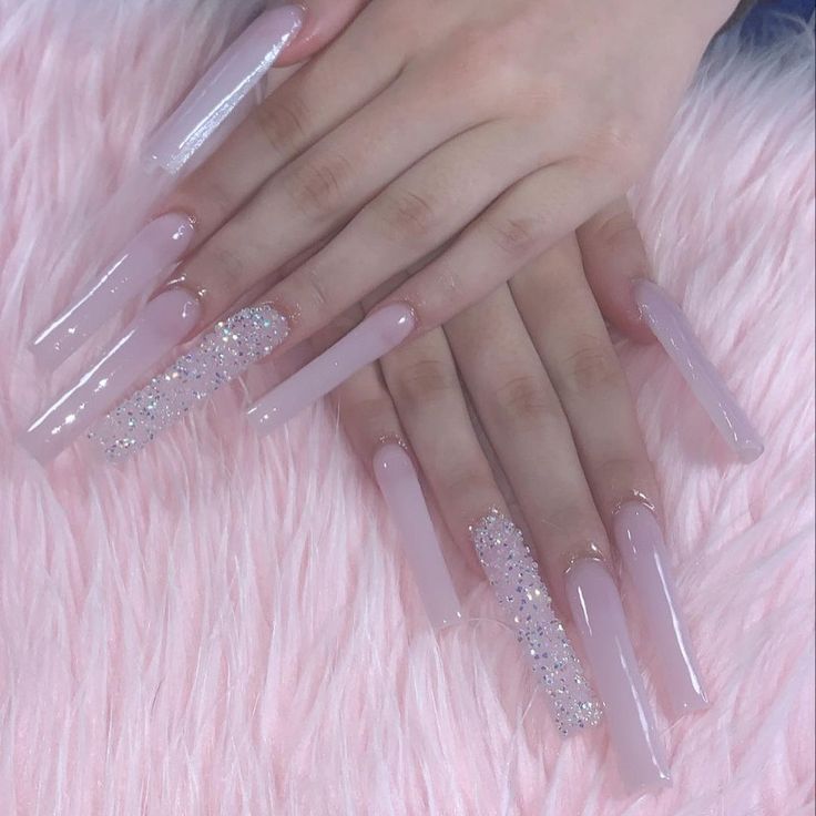 Elegant Soft Pink Long Nails with Sparkling Glitter Accent