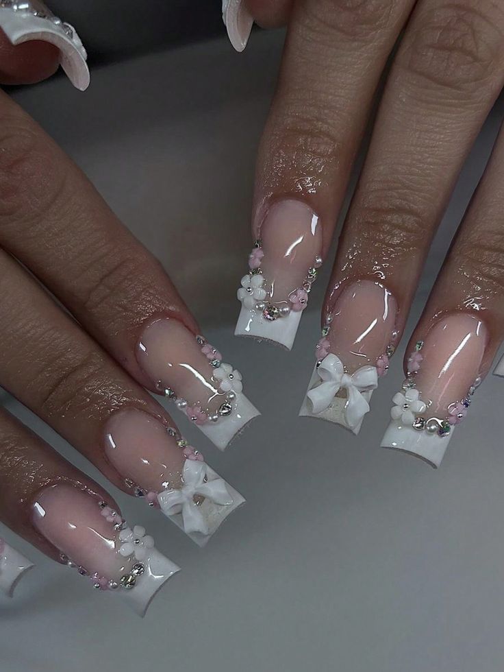 Elegant Floral Nail Design: A Romantic Blend of Soft Hues and Intricate Details.