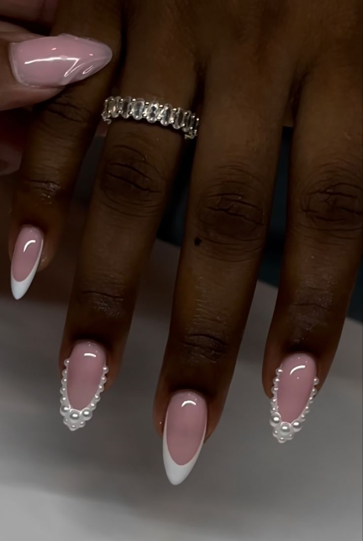 Sophisticated Soft Pink and White French Manicure with Pearl Accents