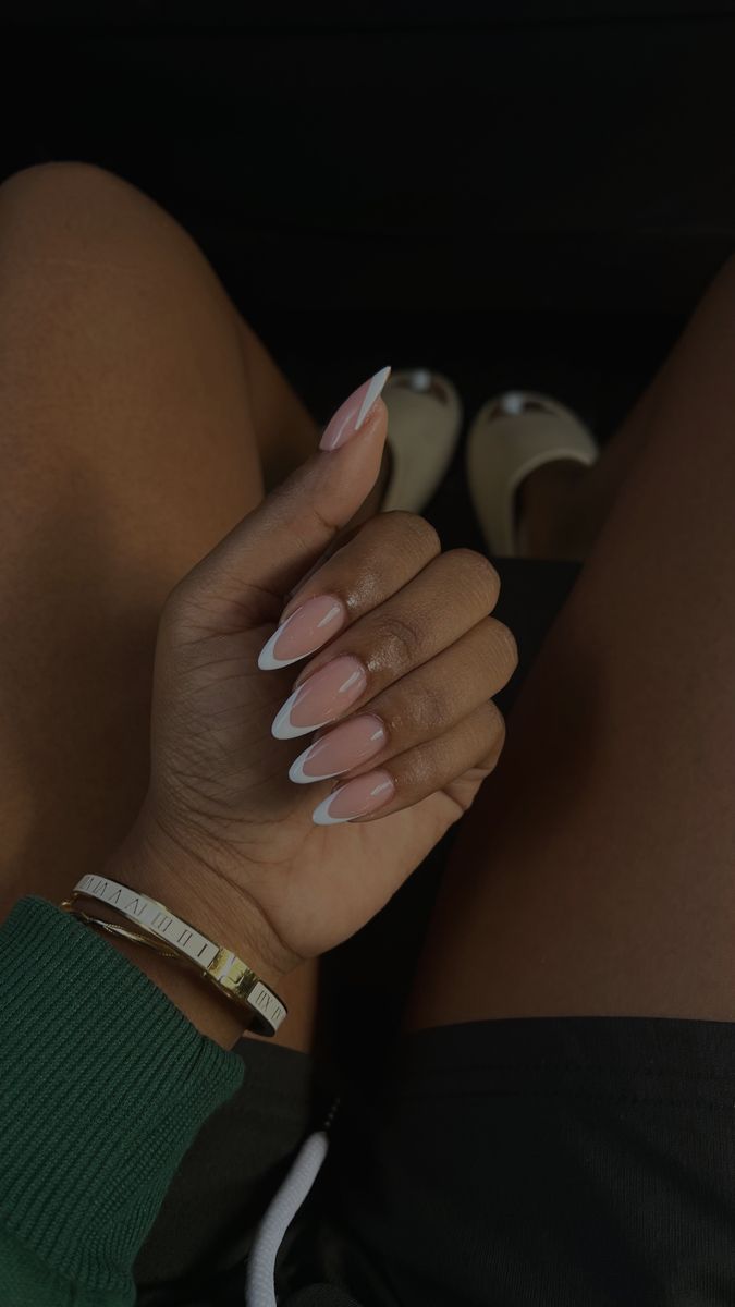 Chic Almond-Shaped French Manicure: Sophisticated Soft Pink with Crisp White Tips for Versatile Style.