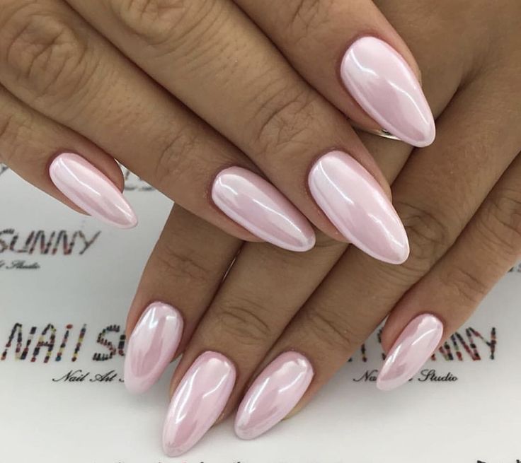 Sophisticated Almond-Shaped Nails with Glossy Pink Finish: Timeless Elegance for Any Occasion.