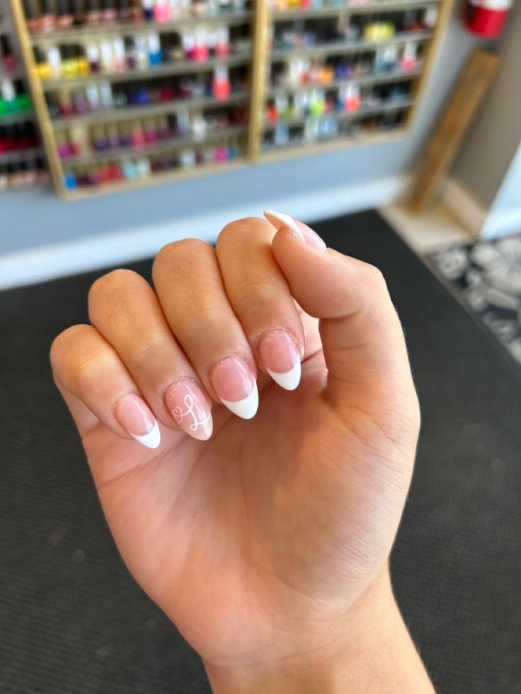 Elegant French Tips with Unique Graphic Accent for a Polished Look