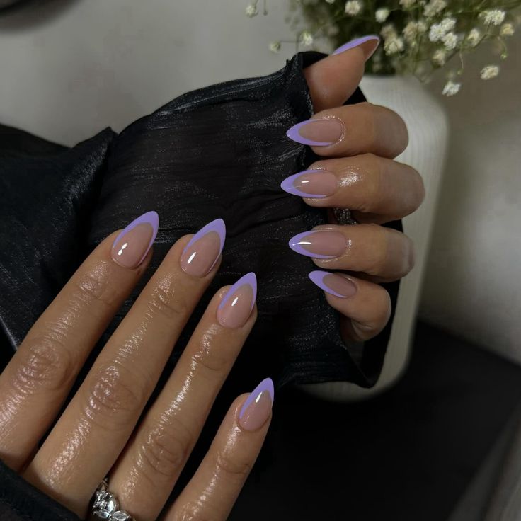 Elegant Almond-Shaped Soft Lavender French Tips for Chic Sophistication.