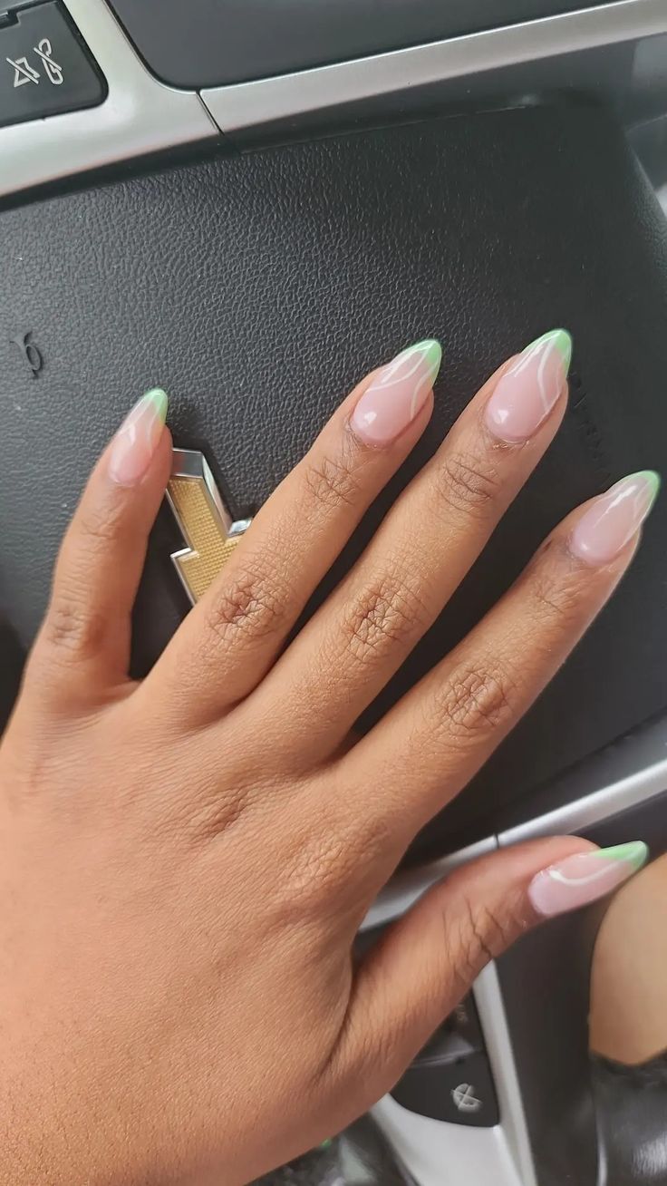 Chic Ombre Nude Nails with Trendy Light Green Tips: A Perfect Blend of Elegance and Playful Flair.