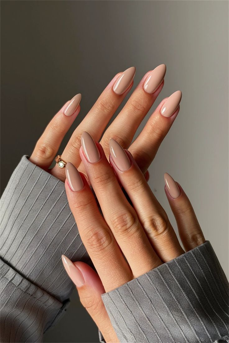 Chic Nude Almond-Shaped Nails for Elegant Sophistication