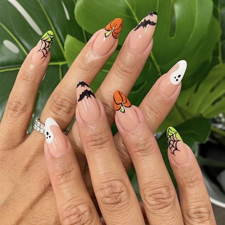 Festive Halloween Nail Design: Playful Pumpkins, Eerie Bats, and Ghostly Motifs