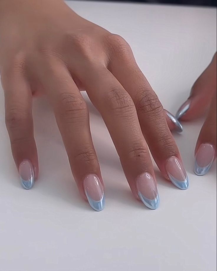 Chic Soft Pink Base with Bold Light Blue Tips for a Modern Nail Design