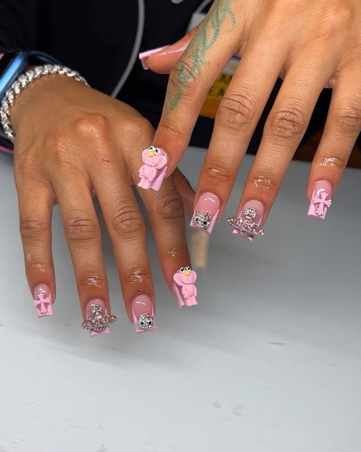 Playful 3D Bear Motif Nail Design with Sparkling Gems and Unique Textures.