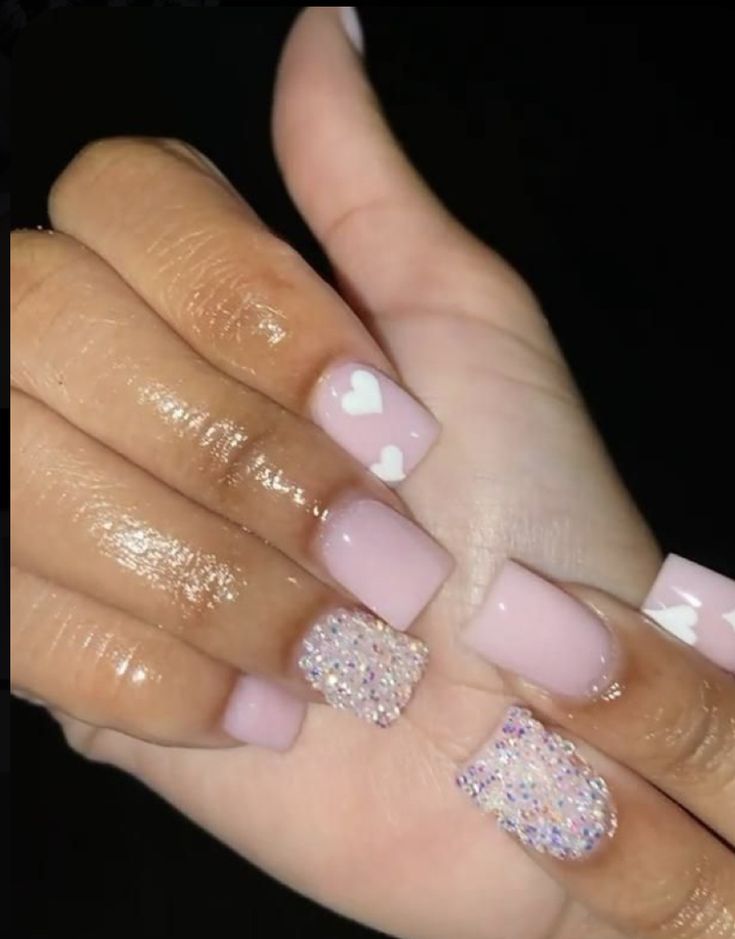 Elegant Soft Pink Nail Design with Matte, Glitter Finishes and Heart Accents