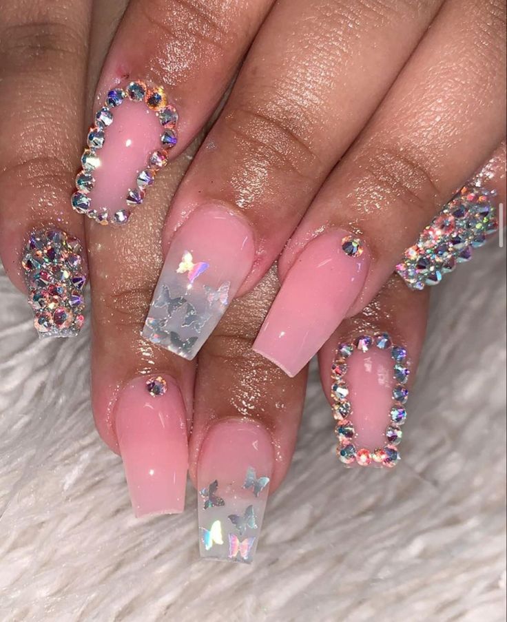 Glamorous Soft Pink Nail Design with Clear Tips and Sparkling Rhinestones.