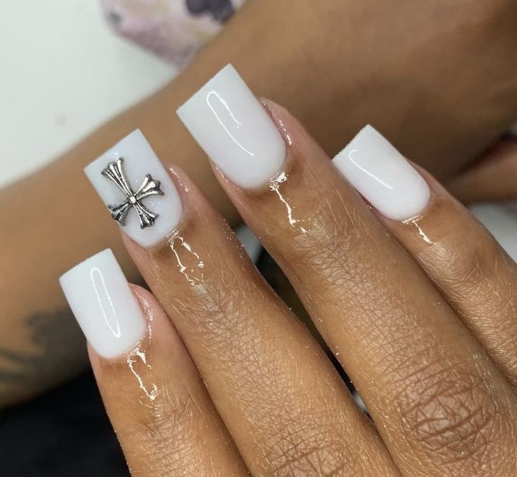 Chic White Square Nails with Metallic Cross Accent for a Modern Touch