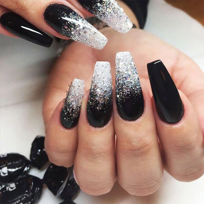 Elegant Black and Silver Gradient Nail Design with Glitter Tips.