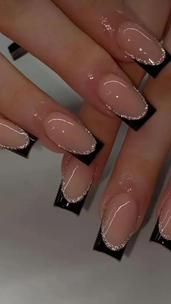 Chic Nude and Black Glitter Nail Design for a Glamorous Touch.