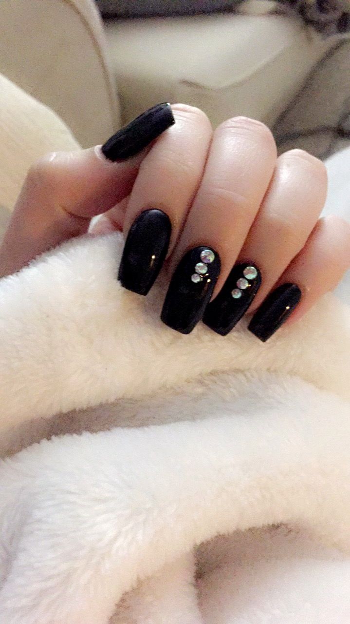 Chic Black Nails with Glossy Finish and Glam Rhinestones.