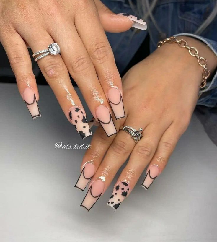 Chic Abstract Nail Design with Nude, Black, and Playful Leopard Accents