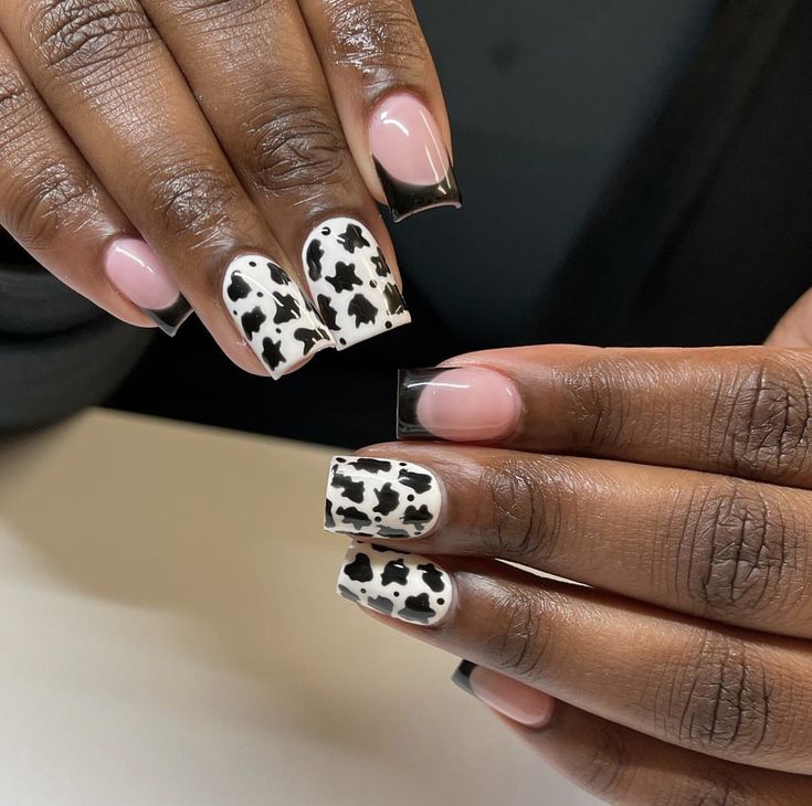 Chic Cow Print Nail Design: A Modern Twist on Classic Elegance.