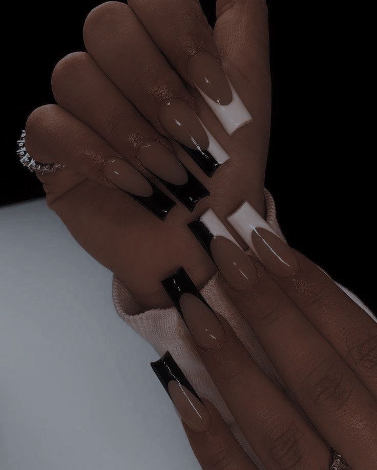 Sophisticated Geometric Nail Design with Bold and Nude Contrast.