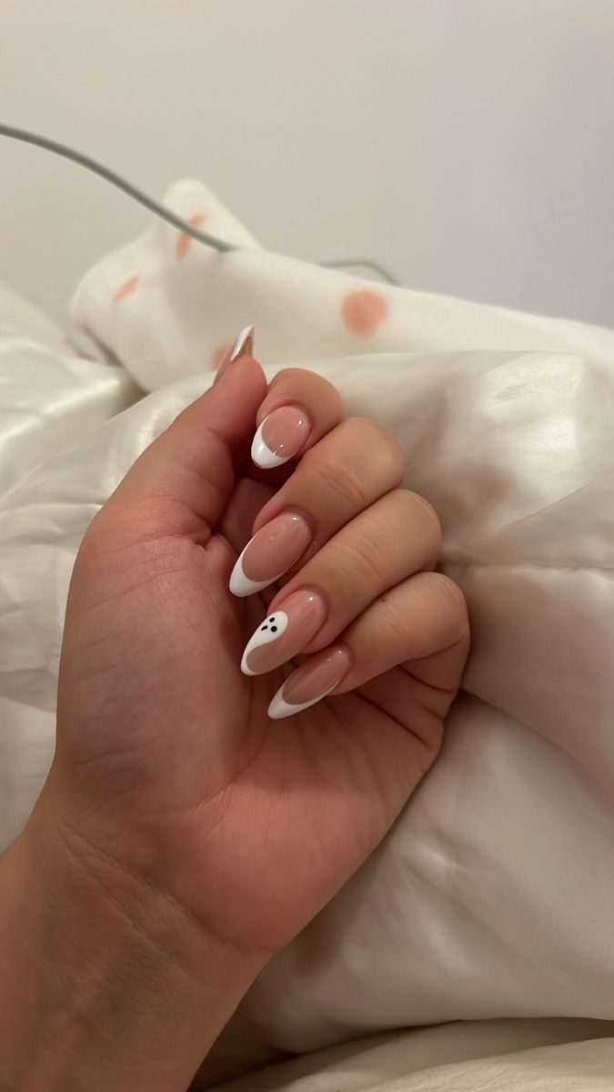 Chic French Manicure with White Tips and Delicate Dot Accent