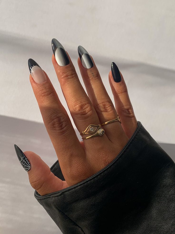 Chic Nail Art: Modern Matte and Glossy Black, White, and Gray Designs with Unique Patterns.