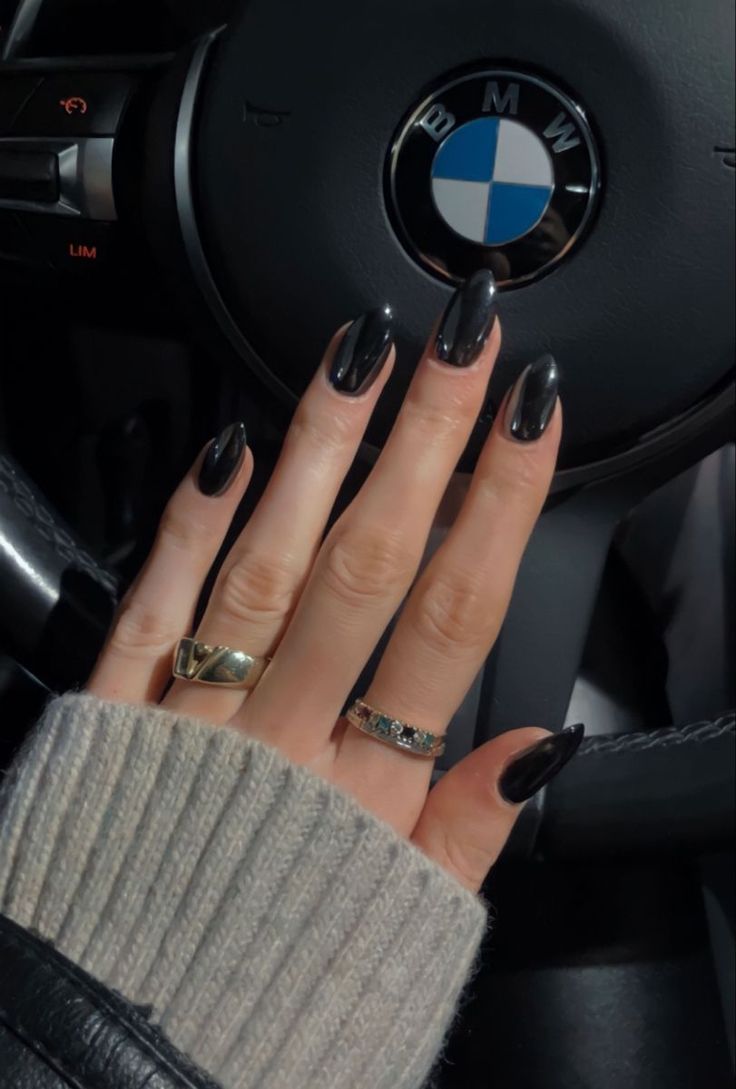 Elegant Sleek Black Nails: A Bold Fashion Statement for Any Occasion.