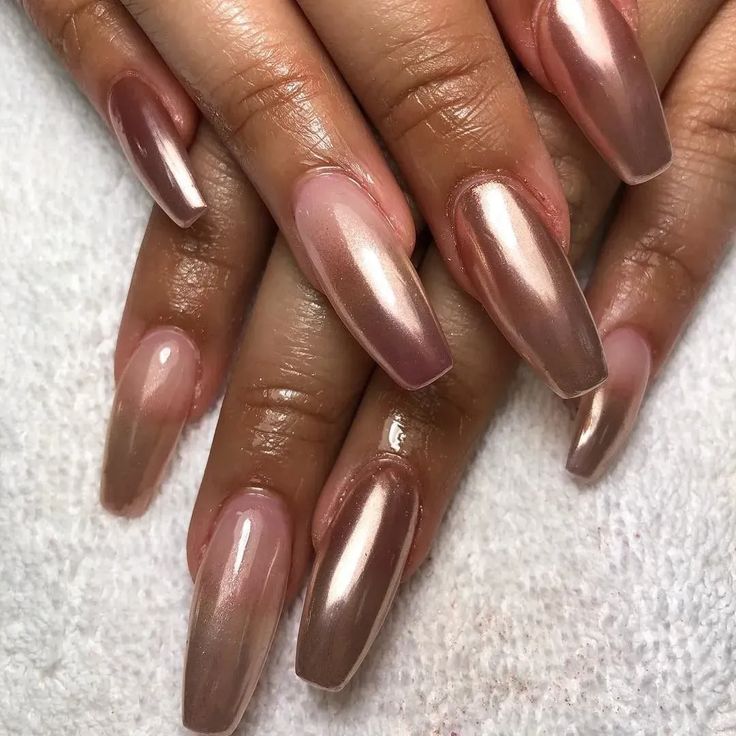 Elegant Ombre Nail Design in Soft Pink and Nude Tones with a Glossy Finish.