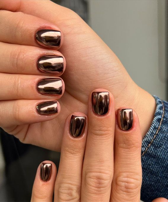 Sleek Chrome Nail Design with Glossy Metallic Finish in Dark Brown and Copper Tones