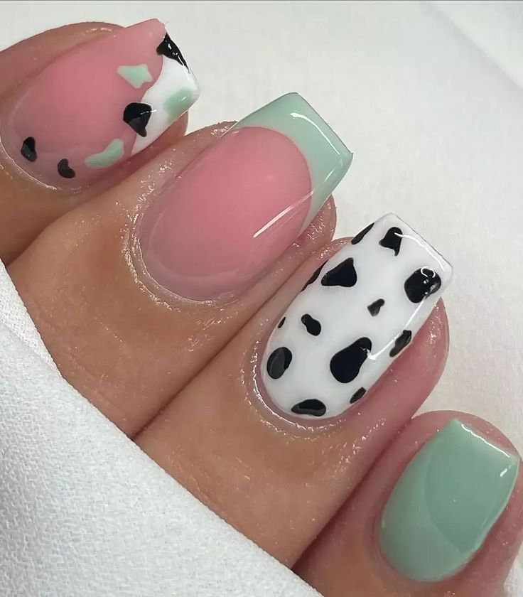 Playful Pastel Nail Art: Vibrant Animal Print Design for Individuality.