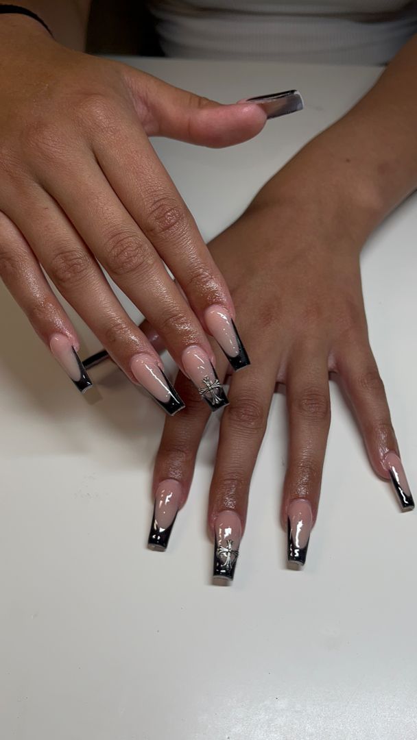 Chic Nude Pink and Black Tip Manicure with Artistic Accent Nail.