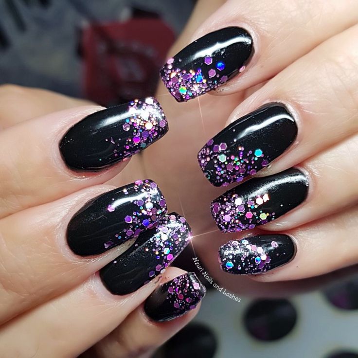 Stunning Glitter Ombre Nails: Black Base with Pink and Purple Sequins for Glamorous Occasions.