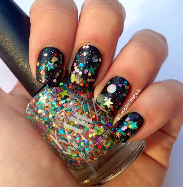 Vibrant Glitter Nail Design with Black Matte Base for Festive Fun.