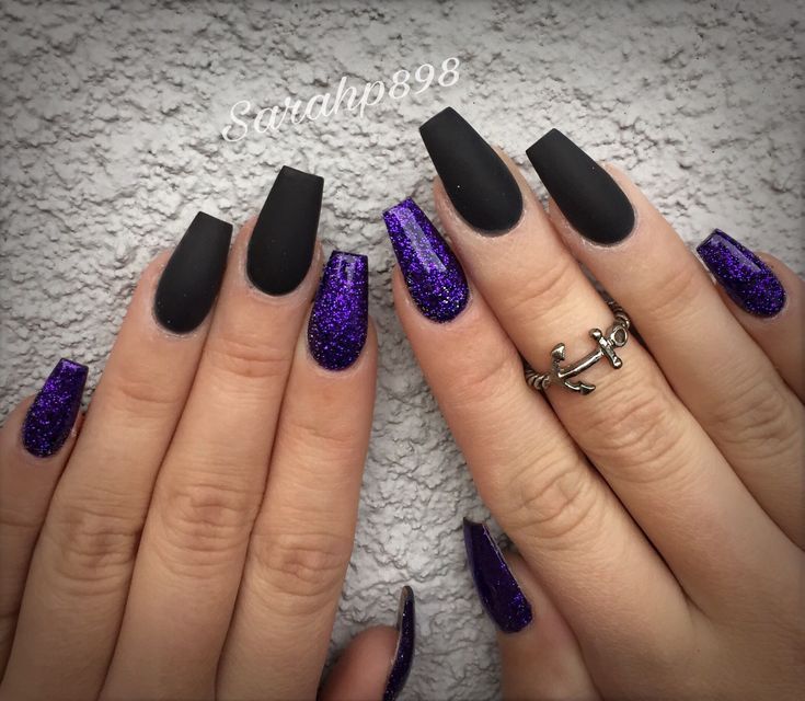 Chic Matte Black and Vibrant Purple Glitter Nail Design: Bold Elegance for Any Occasion.