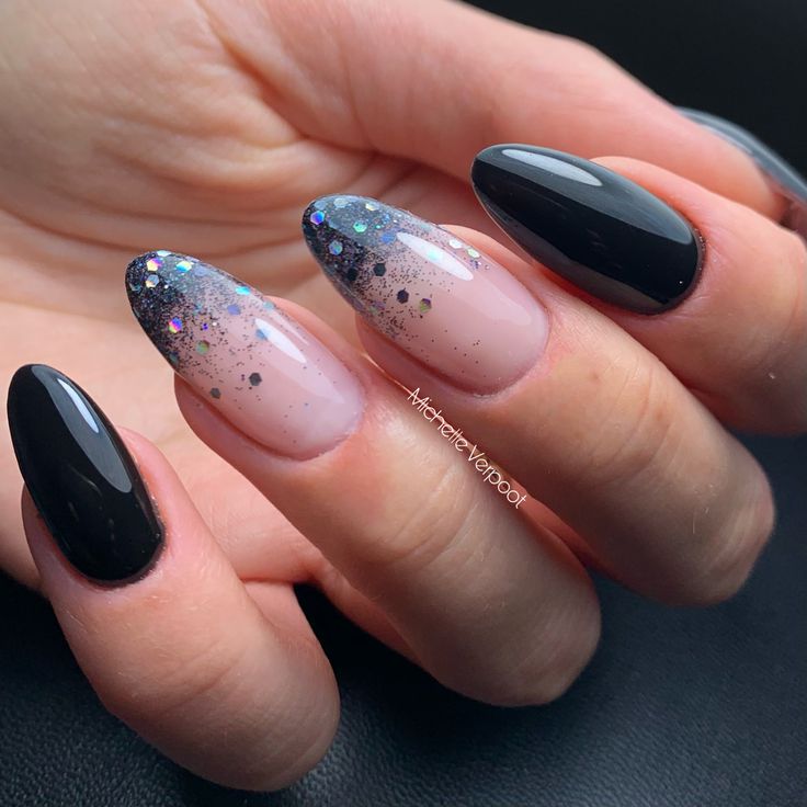 Elegant Black and Soft Nude Gradient Nail Design: A Perfect Blend of Sophistication and Boldness.