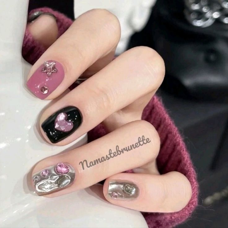 Playful Yet Sophisticated Glamorous Nail Design with Colorful Motifs and Silver Accents.