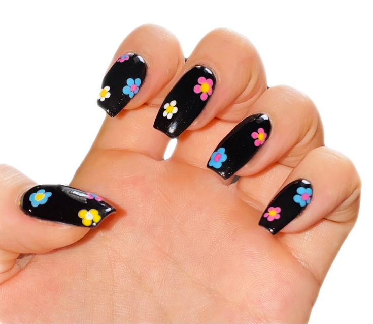 Bold Floral Nail Art: Vibrant Colors on a Striking Black Base