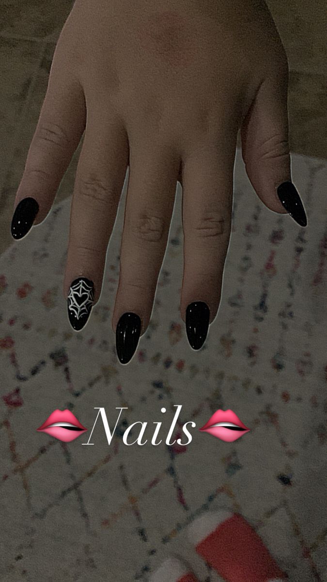 Sophisticated Elegant Black Nail Design with Glossy and Matte Finishes and Intricate Spider Web Accent.