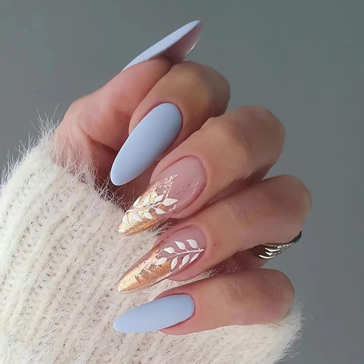 Sophisticated Soft Blue Matte Nails with Gold Foil and Leaf Accents