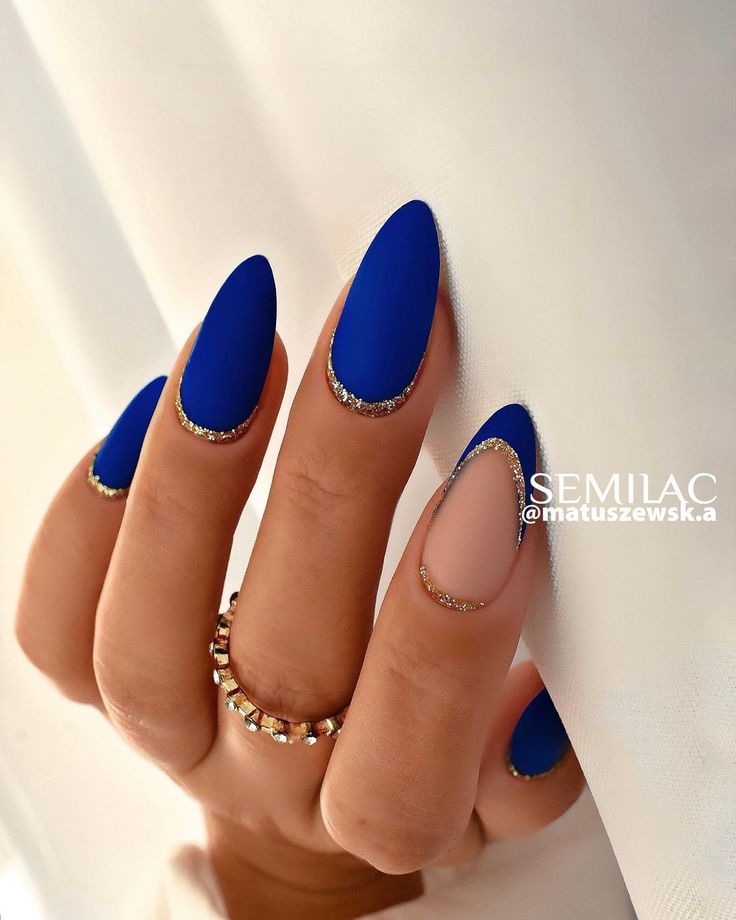 Chic Bold Blue Matte Nails with Unique French Tip and Glitter Accents