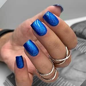 Chic Vibrant Blue Nail Design with Shimmering Finish and Glossy Texture Elevates Modern Aesthetic.