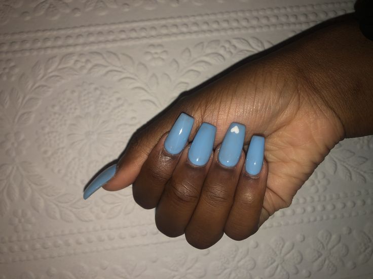 Chic Pastel Blue Nail Design with Elegant Glossy Finish and Playful Heart Detail