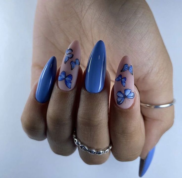 Chic Nail Design: Elegant Deep Blue and Nude Fusion with Intricate Butterfly and Flower Art