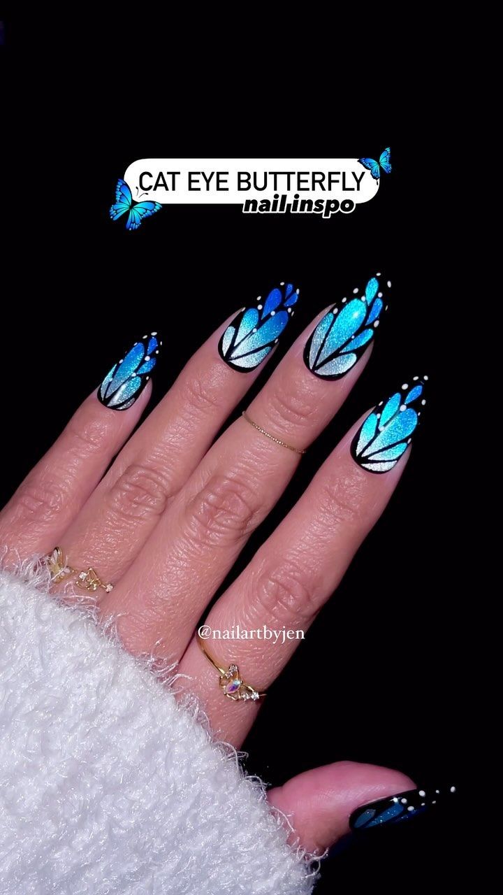 Stunning Butterfly-Inspired Nail Design with Gradient Blues and Cat-Eye Effect