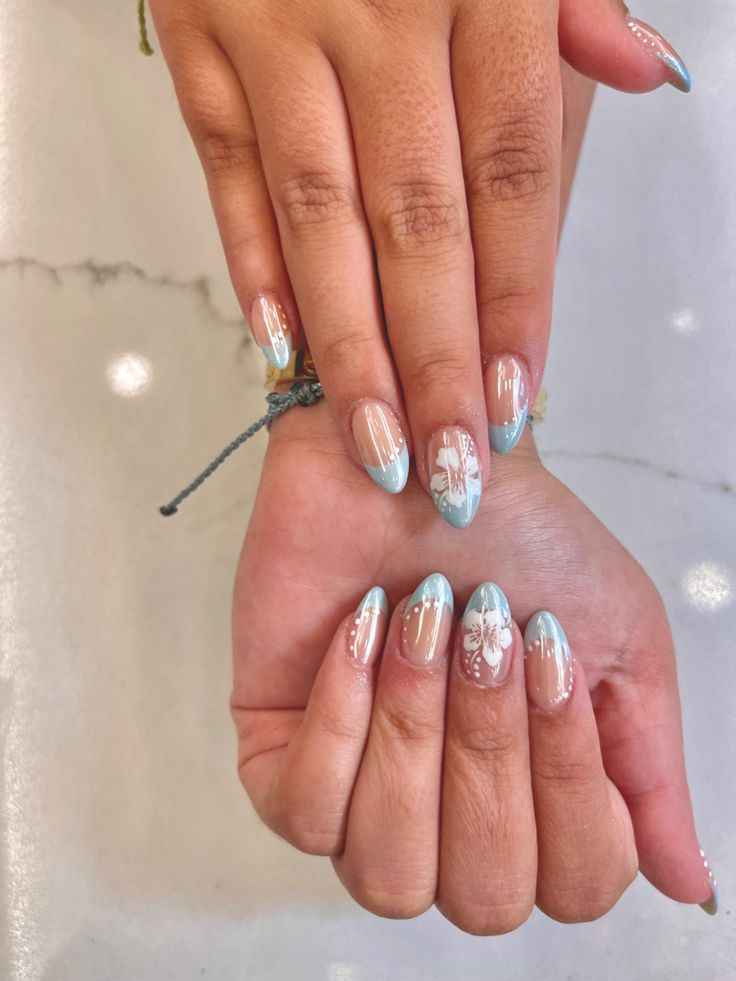 Sophisticated Pastel Nail Design with Floral Accents.