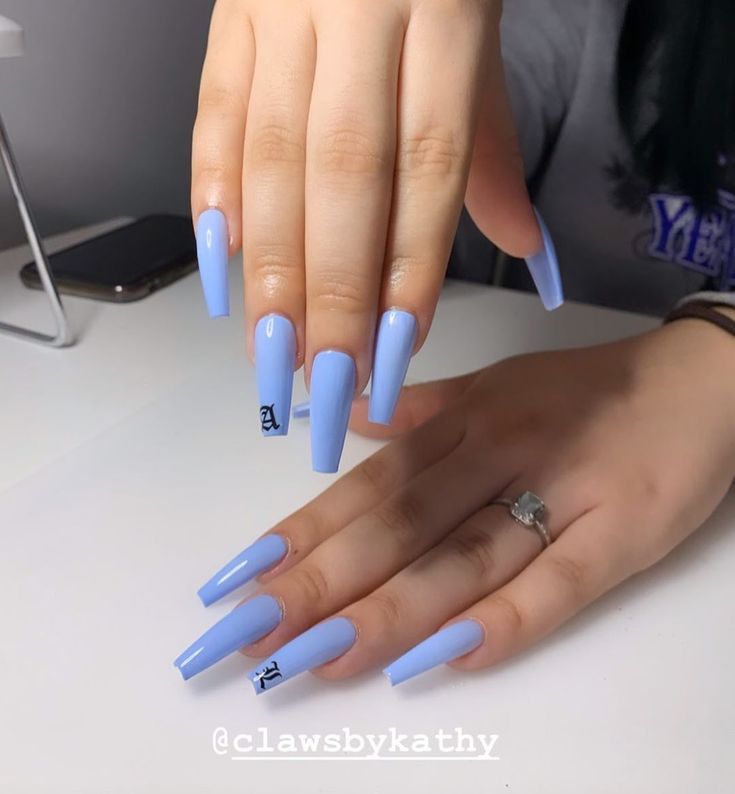 Elegant Lavender Acrylic Nails with Unique Playful Design.